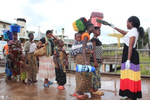 From Kigoma port, refugees must take a bus to Lake Tanganyika Stadium for registration. Safety screenings are conducted as they disembark at Kigoma port.