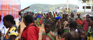 Fleeing Burundian families make the next step of their journey, on their way to Lake Tanganyika Stadium where they will get registered.  Burundian refugees boarding a bus to Lake Tanganyika Stadium before being moved to the now overflowing Nyarugusu camp.