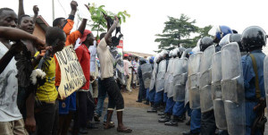  Demonstrators face off against police officers during a protest against President Pierre Nkurunziza's third term bid in Musaga, outskirts of the capital Bujumbura, on April 30, 2015. AFP PHOTO | FILE |  AFP By TREVOR ANALO and MOSES HAVYARIMANA