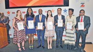 Left to right Katerina Kyrili (BIMA), Oyimade Ogunade (GT Bank), Oscar Onyema (Nigerian Stock Exchange), Helen Hai, (Made in Africa Initiative) Mohammed Dewji (MeTL), Daphne Nkosi (Kalagadi Manganese, Arun Menon, Abellon, with their award certificates soon after being recognized.  