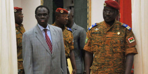  Interim president Michel Kafando (L) walks with Prime Minister Isaac Zida (R) at the presidential palace in Ouagadougou on November 19, 2014. PHOTO | FILE |  AFP By AFP