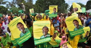 Supporters of Chama Cha Mapinduzi (CCM) cheer as Zanzibar presidential candidate, Dr Ali Mohamed Shein, addressed a campaign rally at Konde in Micheweni District Mpira Konde grounds, Pemba North Region yesterday.